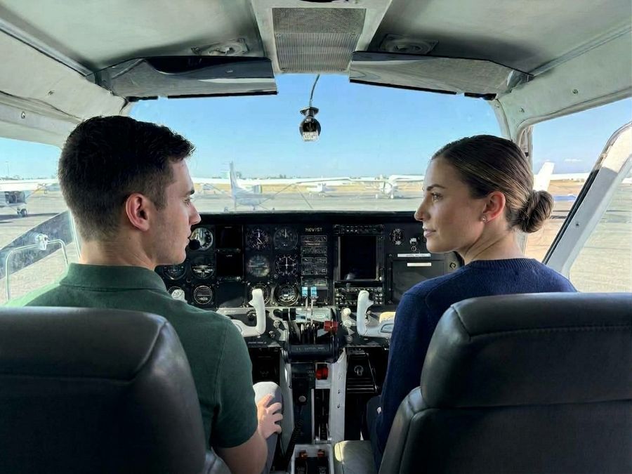 multi-engine student and flight instructor in the cockpit of the twin before a training flight